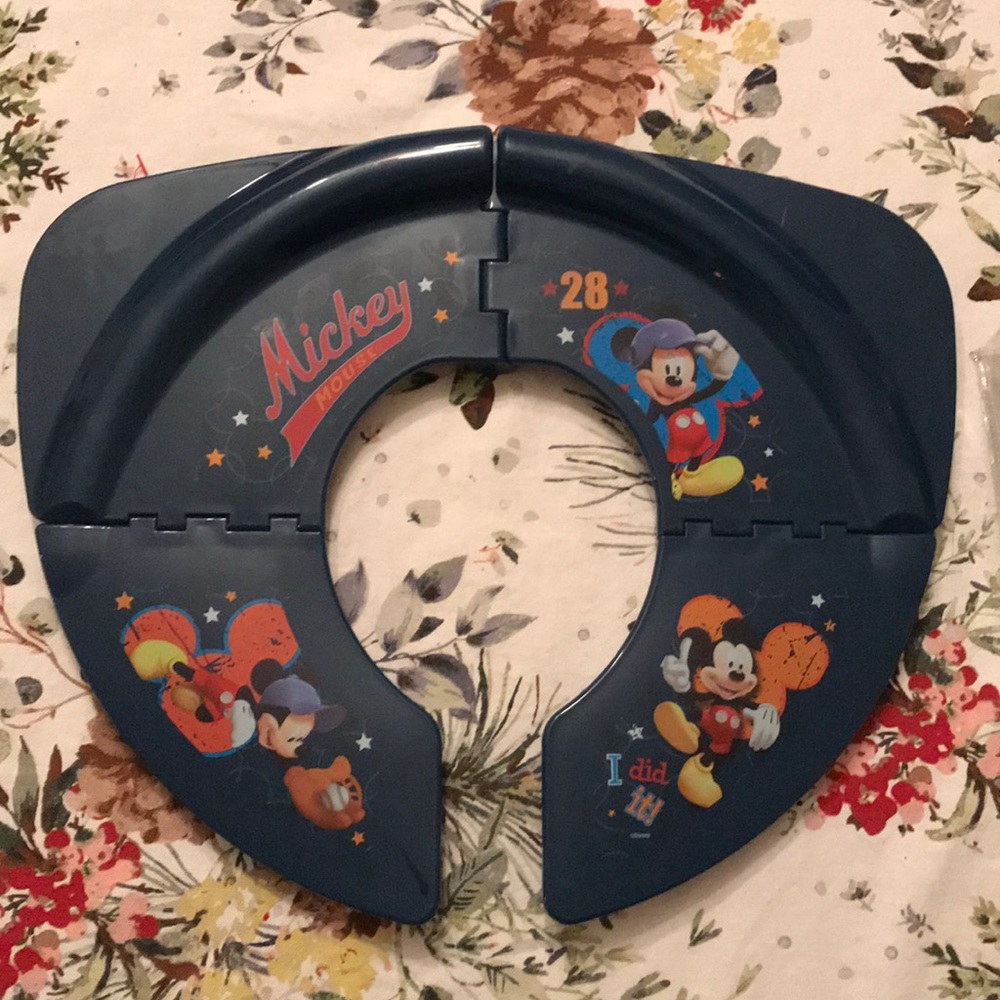 New and unused- Disney travel potty seat